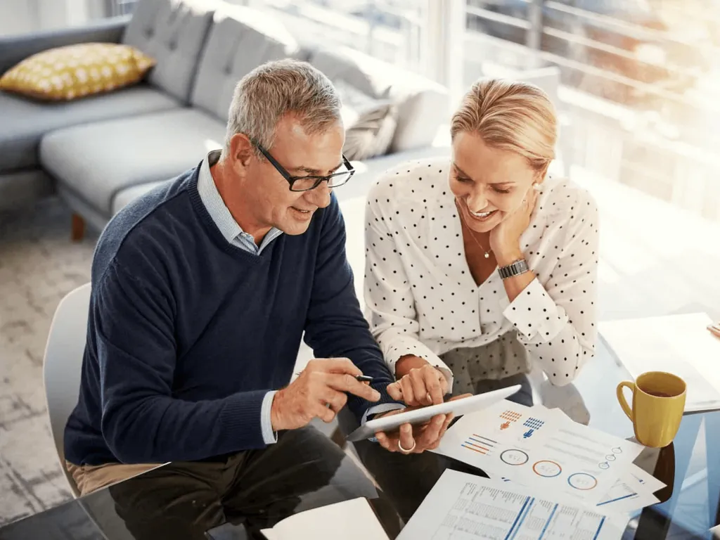 Couple reviewing paperwork with an asset protection Medicaid planner in Pennsylvania